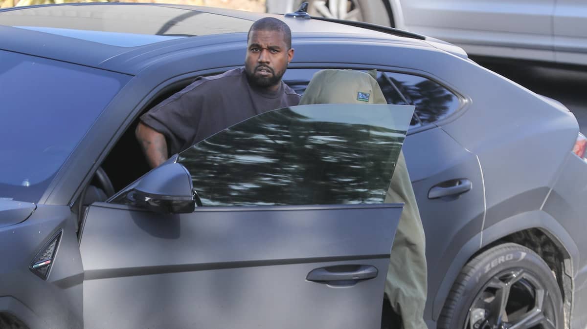 Photos Show Kanye West Helping Out Homeless Veteran On Side Of Road -  LADbible