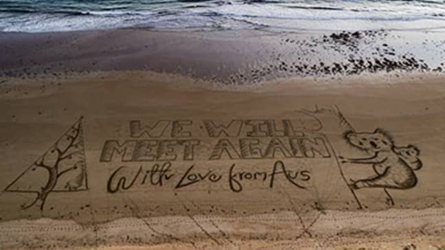 Giant Christmas Card Message Appears On Australian Beach - LADbible